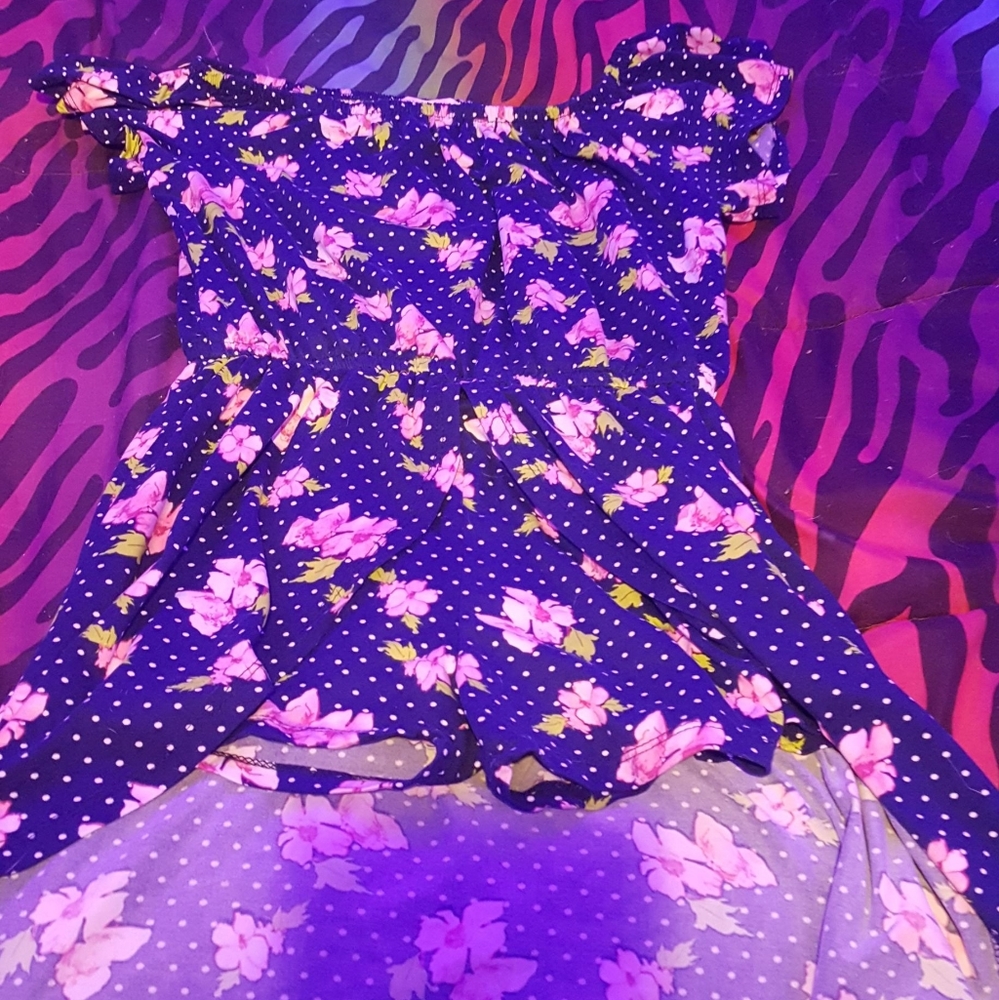 Dark blue romper with a flowy back